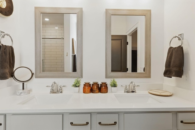 bathroom featuring double vanity