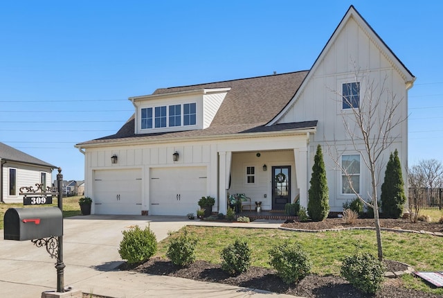 modern farmhouse with board and batten siding, a shingled roof, driveway, a garage, and a porch