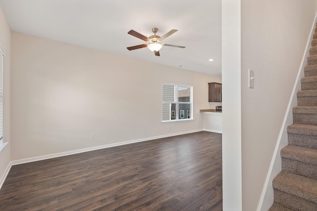6078 Cullen Dr, La Vergne, TN 37086 - unfurnished living room with dark wood finished floors, stairway, baseboards, and a ceiling fan