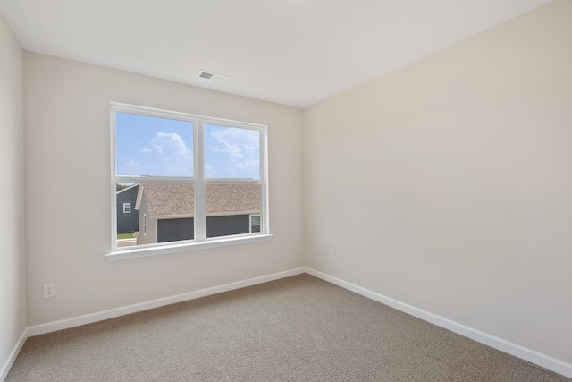 6078 Cullen Dr, La Vergne, TN 37086 - empty room featuring carpet flooring, baseboards, and visible vents