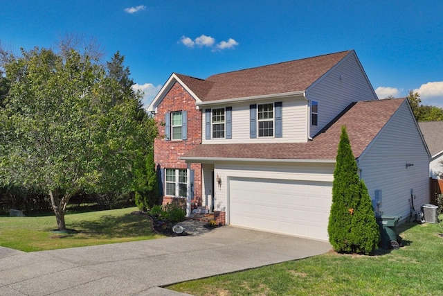 view of front of home featuring a front yard, driveway, roof with shingles, central AC, and brick siding