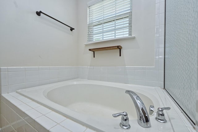 full bathroom with a garden tub