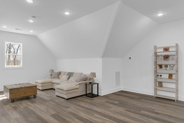 living area with lofted ceiling, baseboards, visible vents, and dark wood-style flooring