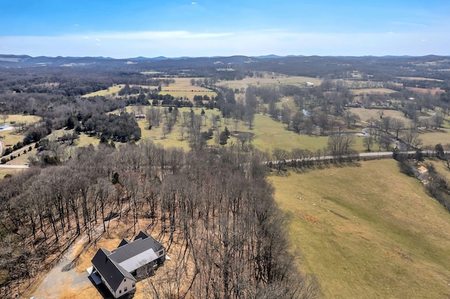 aerial view featuring a rural view and a mountain view