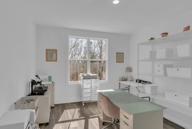 office space featuring recessed lighting, baseboards, and dark wood-type flooring