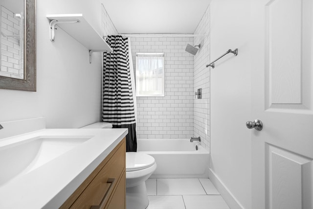 bathroom featuring tile patterned flooring, baseboards, shower / bath combo with shower curtain, toilet, and vanity