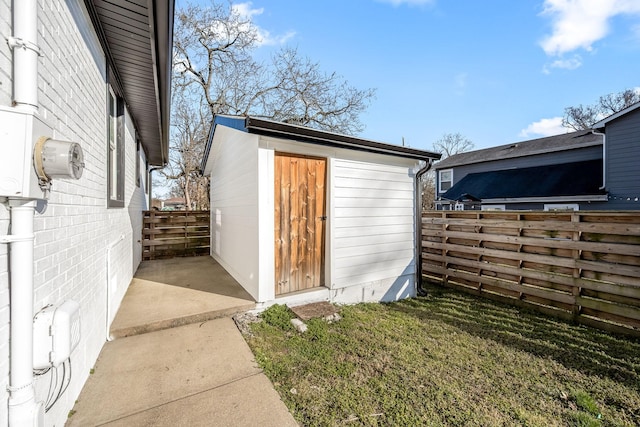 view of outdoor structure with an outdoor structure and fence