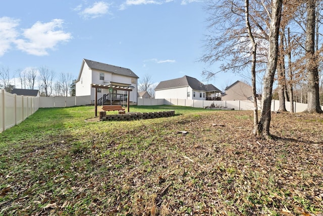 view of yard with a fenced backyard