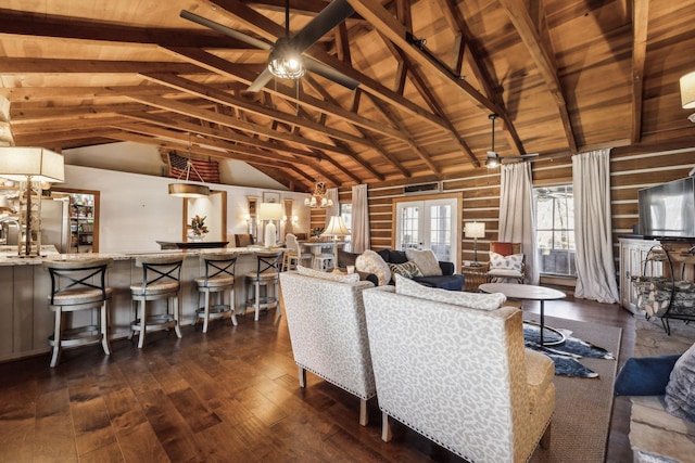 living area with high vaulted ceiling, beam ceiling, dark wood-type flooring, french doors, and wooden ceiling