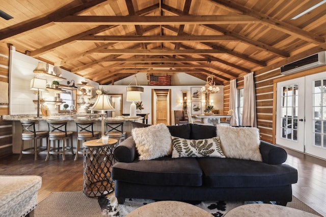 living area featuring a wall unit AC, vaulted ceiling with beams, dark wood-type flooring, wood ceiling, and a notable chandelier