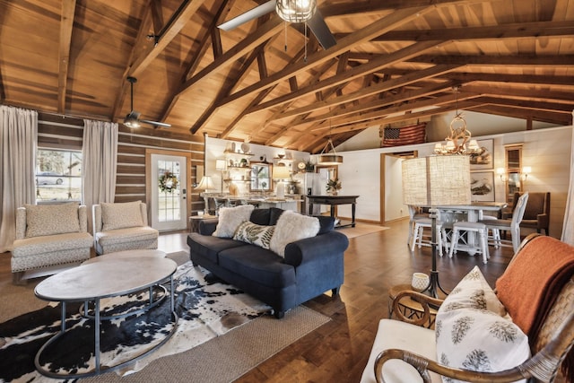 living area featuring wood finished floors, high vaulted ceiling, wood ceiling, beamed ceiling, and ceiling fan with notable chandelier
