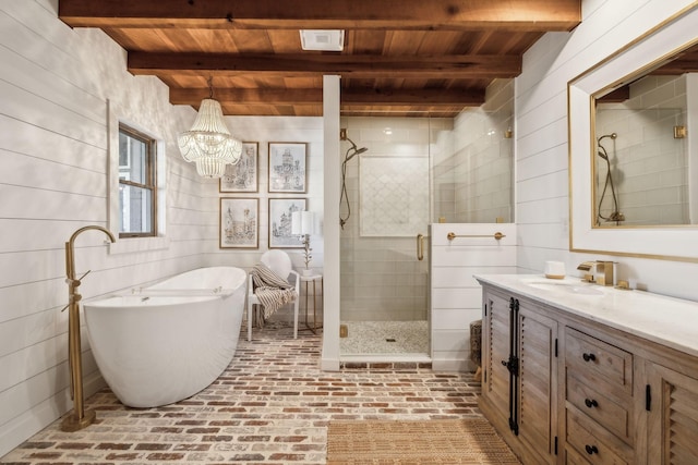 full bathroom with vanity, beam ceiling, brick floor, a shower stall, and wooden ceiling
