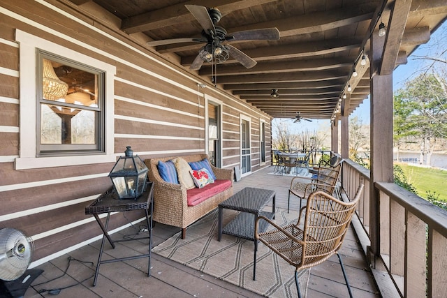 exterior space with a ceiling fan and an outdoor hangout area