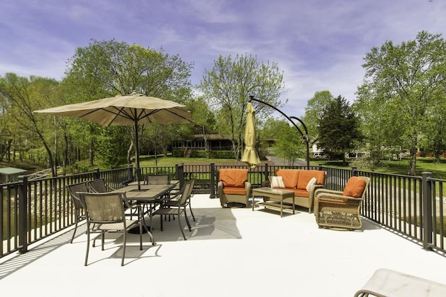view of patio / terrace featuring outdoor dining area and an outdoor hangout area