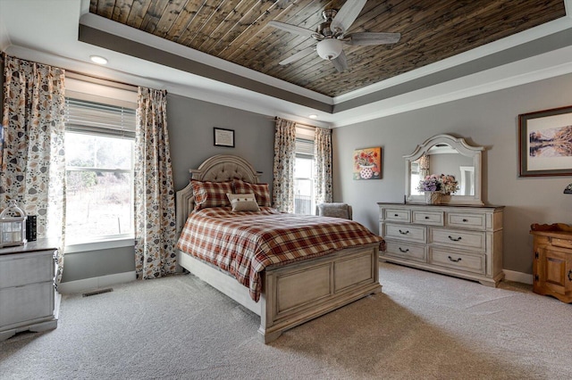 bedroom with visible vents, a raised ceiling, baseboards, and wooden ceiling