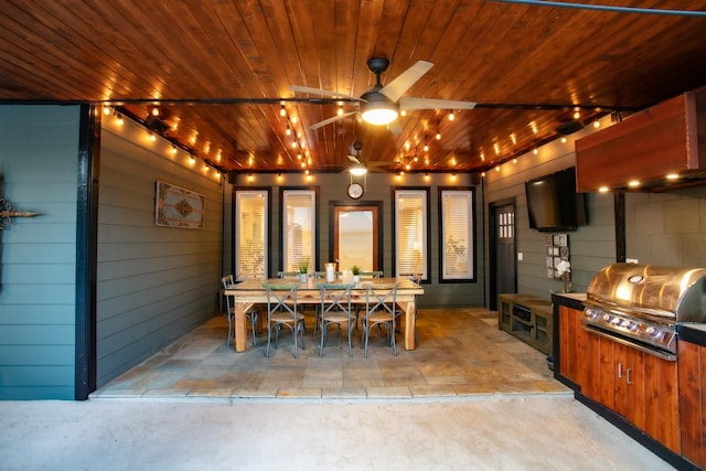 view of patio / terrace with area for grilling, outdoor dining area, and ceiling fan