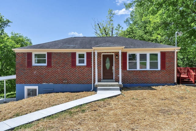 view of front facade featuring brick siding