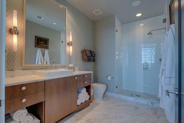 bathroom featuring visible vents, wallpapered walls, toilet, a stall shower, and marble finish floor