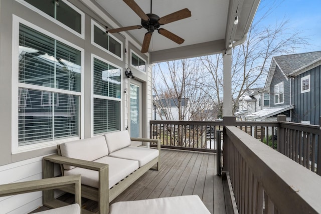 wooden terrace with ceiling fan