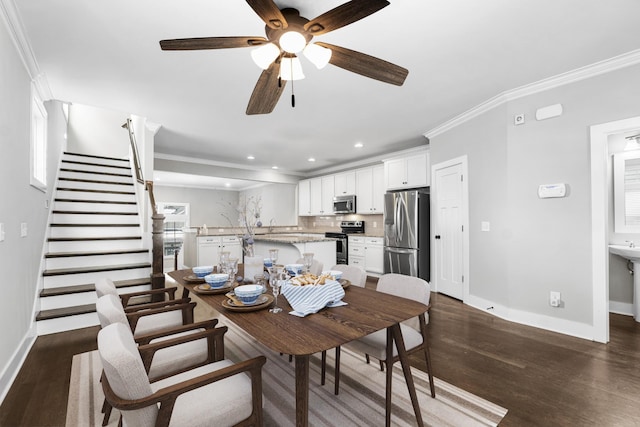 dining space with recessed lighting, baseboards, ornamental molding, and dark wood-style flooring