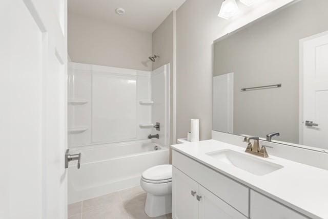 full bathroom featuring tile patterned floors, toilet, vanity, and shower / bathing tub combination