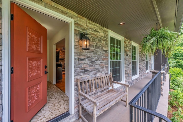 doorway to property with covered porch