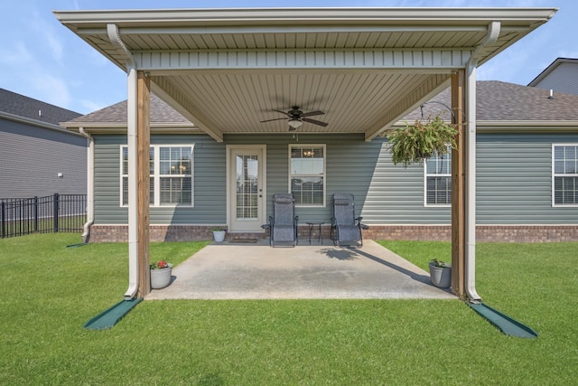 view of patio / terrace with fence and ceiling fan