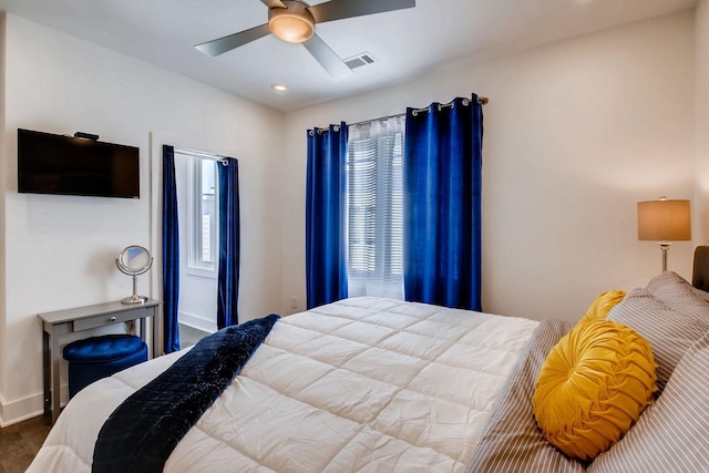 bedroom featuring recessed lighting, visible vents, baseboards, and a ceiling fan