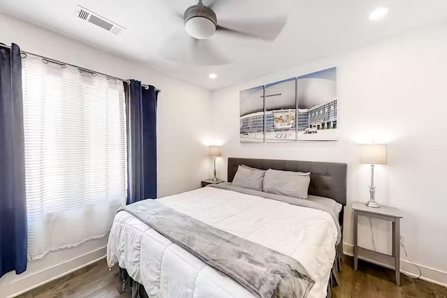 bedroom featuring visible vents, ceiling fan, baseboards, recessed lighting, and wood finished floors