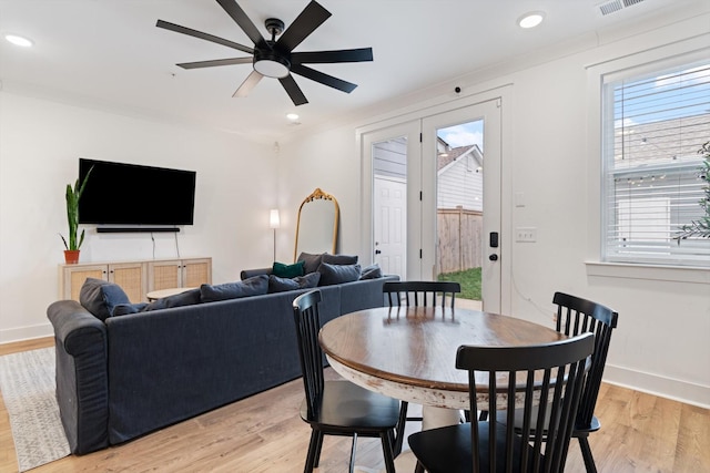 dining area with recessed lighting, light wood-style flooring, baseboards, and ceiling fan