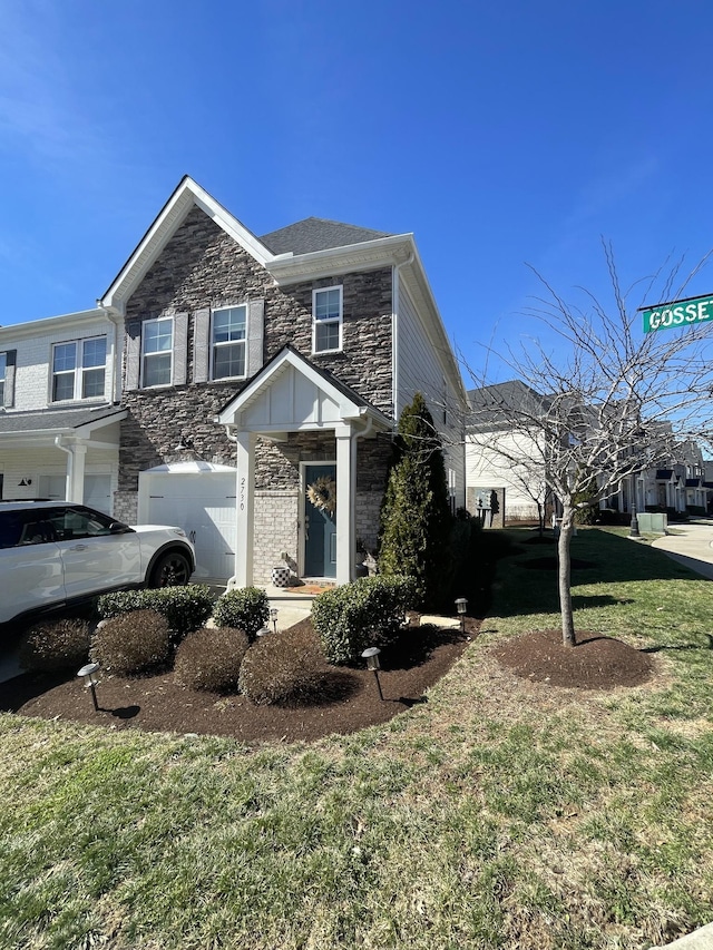 view of front of property with stone siding and a front yard