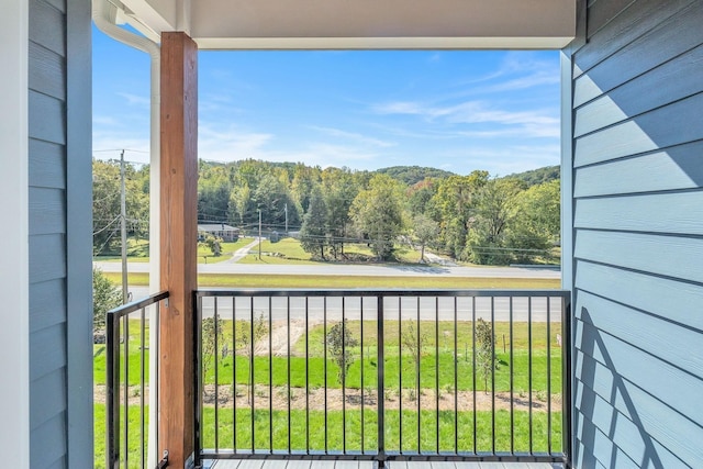 balcony with a forest view