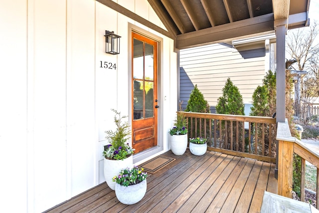 wooden terrace featuring a porch