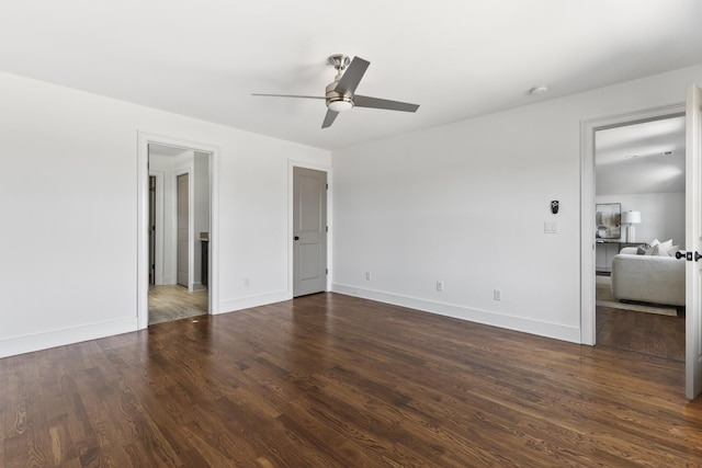 unfurnished bedroom featuring wood finished floors, baseboards, and ceiling fan