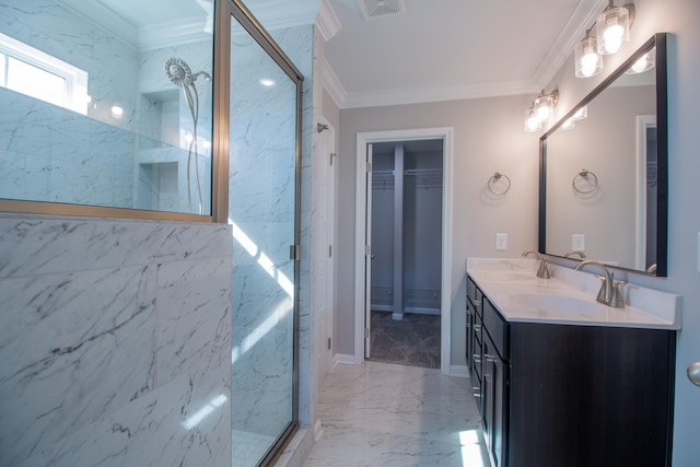 bathroom featuring marble finish floor, a sink, a marble finish shower, crown molding, and double vanity