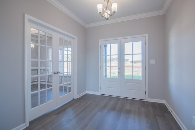 doorway featuring dark wood finished floors, crown molding, french doors, and baseboards