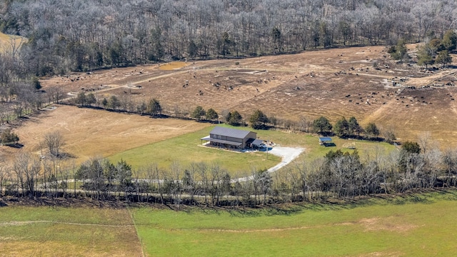 birds eye view of property with a rural view