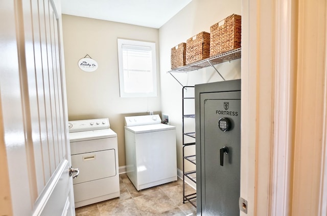 washroom with laundry area and washer and dryer