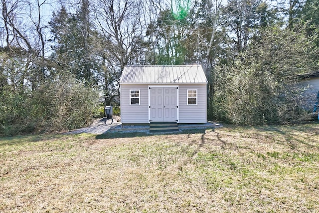 view of outbuilding with an outbuilding