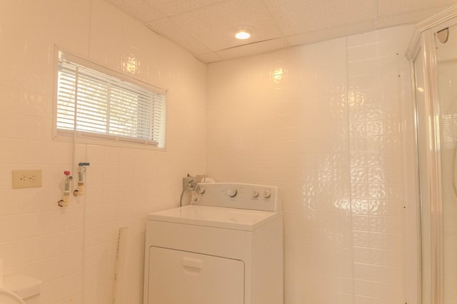 washroom featuring laundry area and washer / clothes dryer