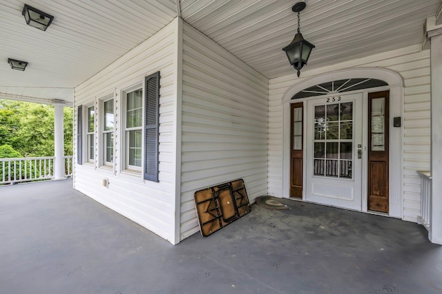 253 Main St, Ducktown, TN 37326 - doorway to property featuring a porch