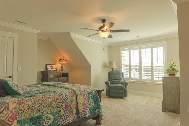 carpeted bedroom with visible vents, a ceiling fan, crown molding, and baseboards