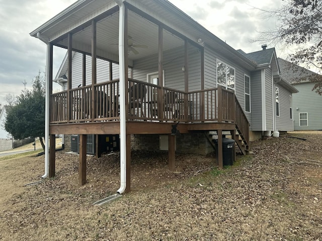 exterior space featuring ceiling fan