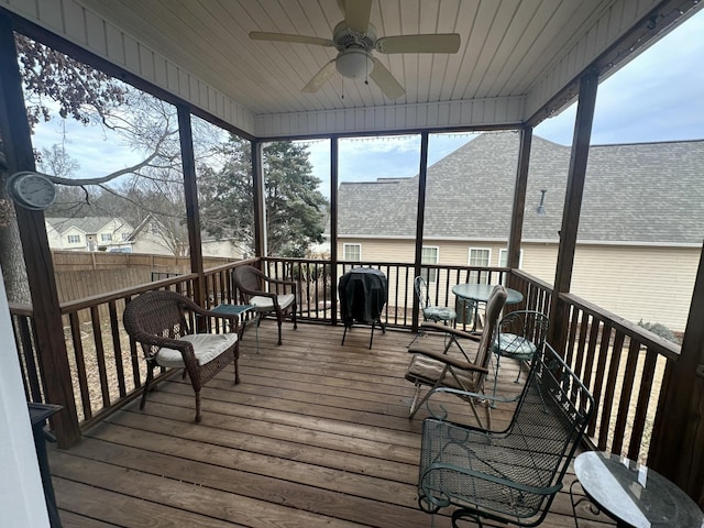 exterior space with a ceiling fan