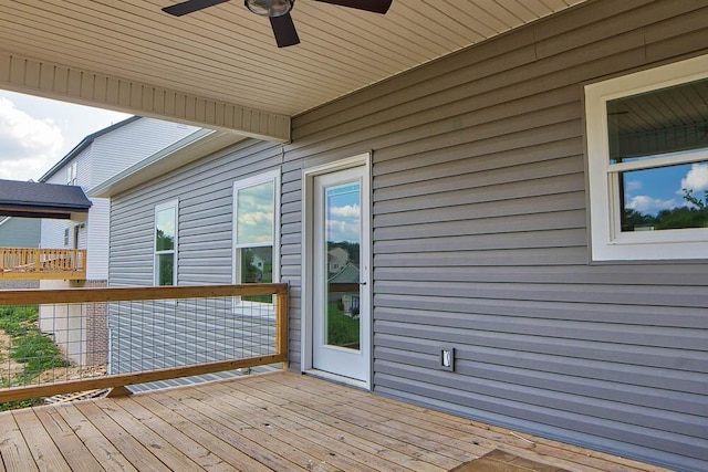 wooden terrace with ceiling fan