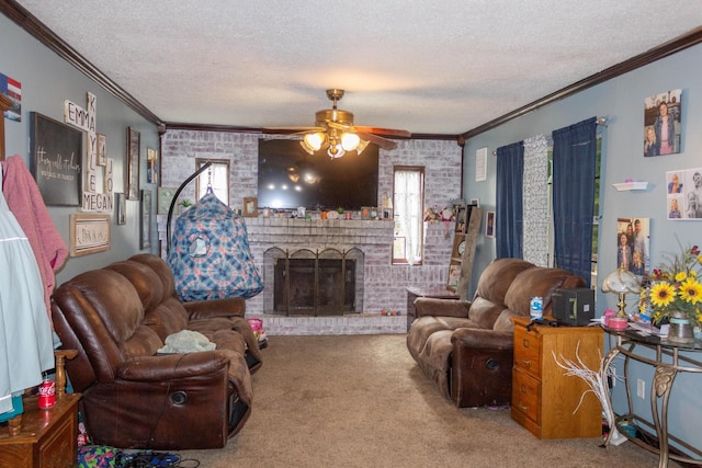 living room featuring a ceiling fan, carpet, ornamental molding, a textured ceiling, and a brick fireplace