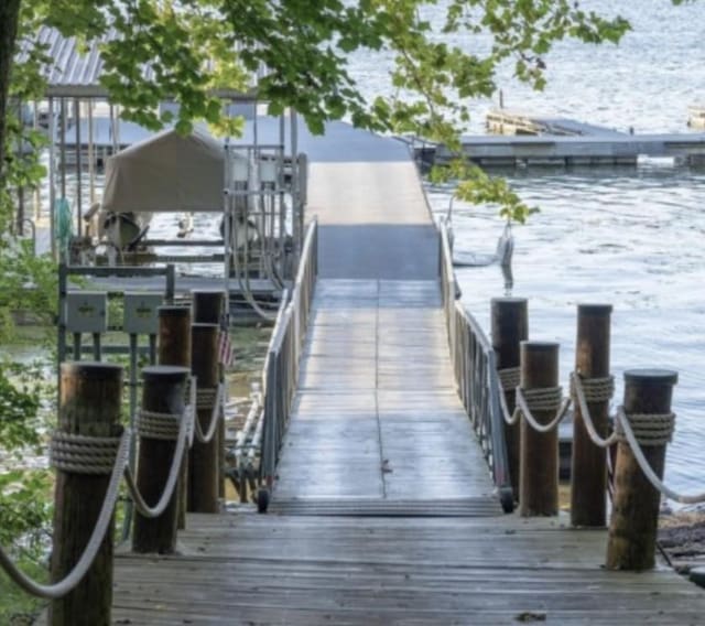 view of dock with a water view