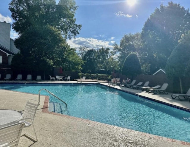 pool with a patio area