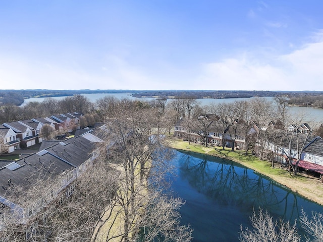 bird's eye view with a residential view and a water view