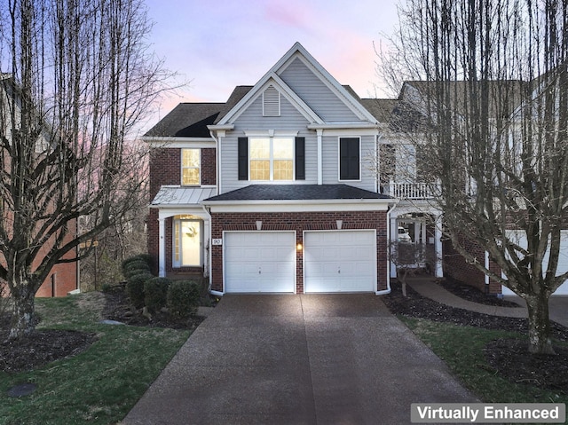 traditional-style home featuring brick siding, concrete driveway, and a garage